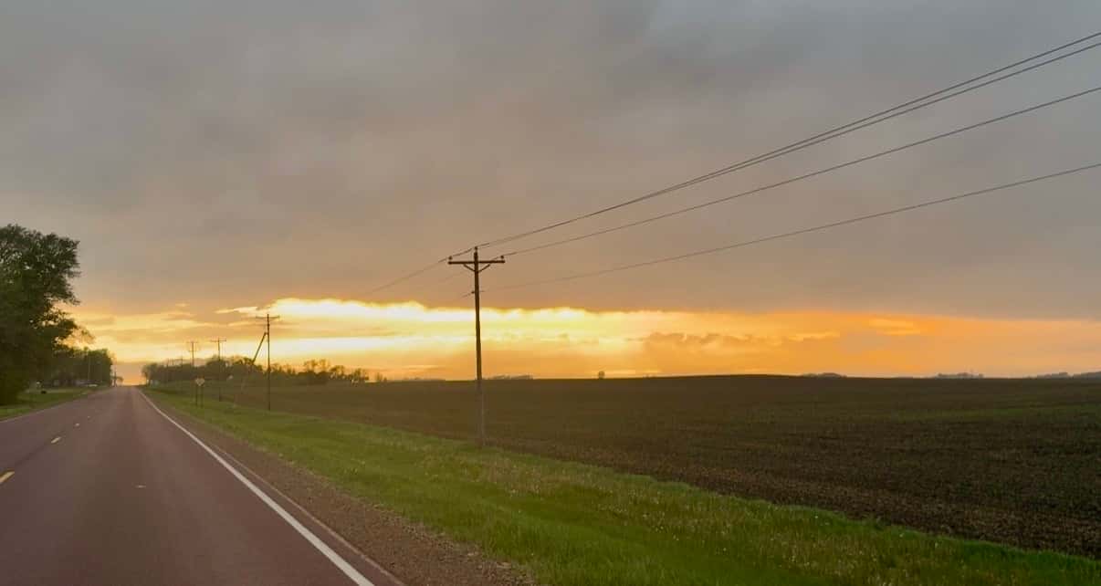 Sun setting over a beautiful field